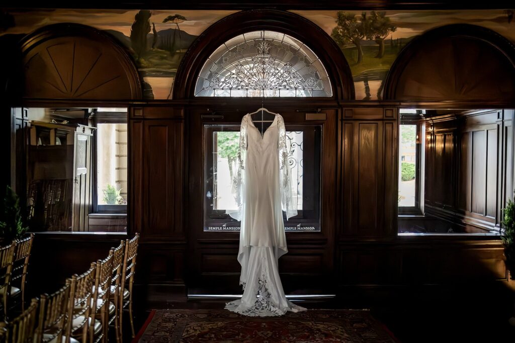 wedding dress hanging up at semple mansion, mn