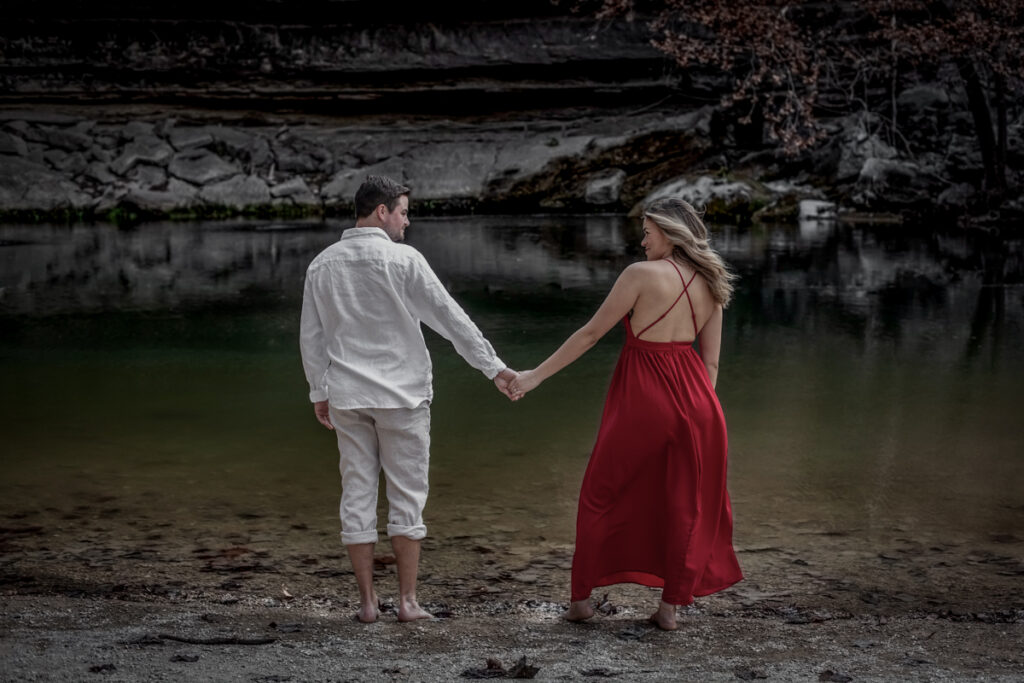 stunning engagement photo session of a young couple at Hamilton Pool Preserve and Hotel Vista