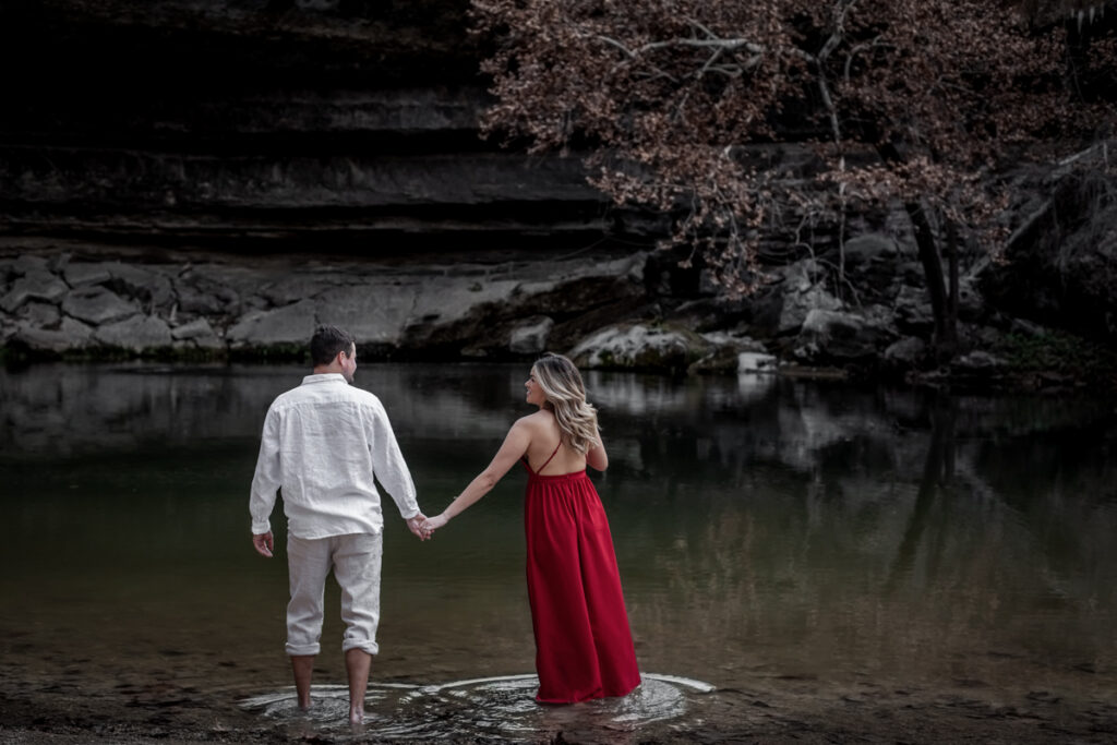 stunning engagement photo session of a young couple at Hamilton Pool Preserve and Hotel Vista