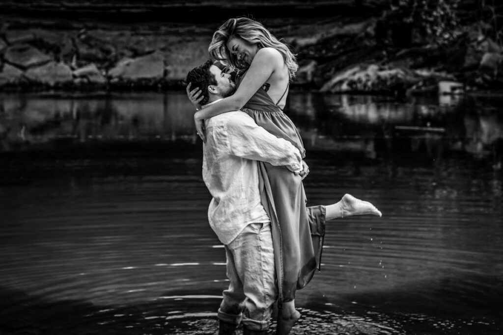 stunning engagement photo session of a young couple at Hamilton Pool Preserve and Hotel Vista