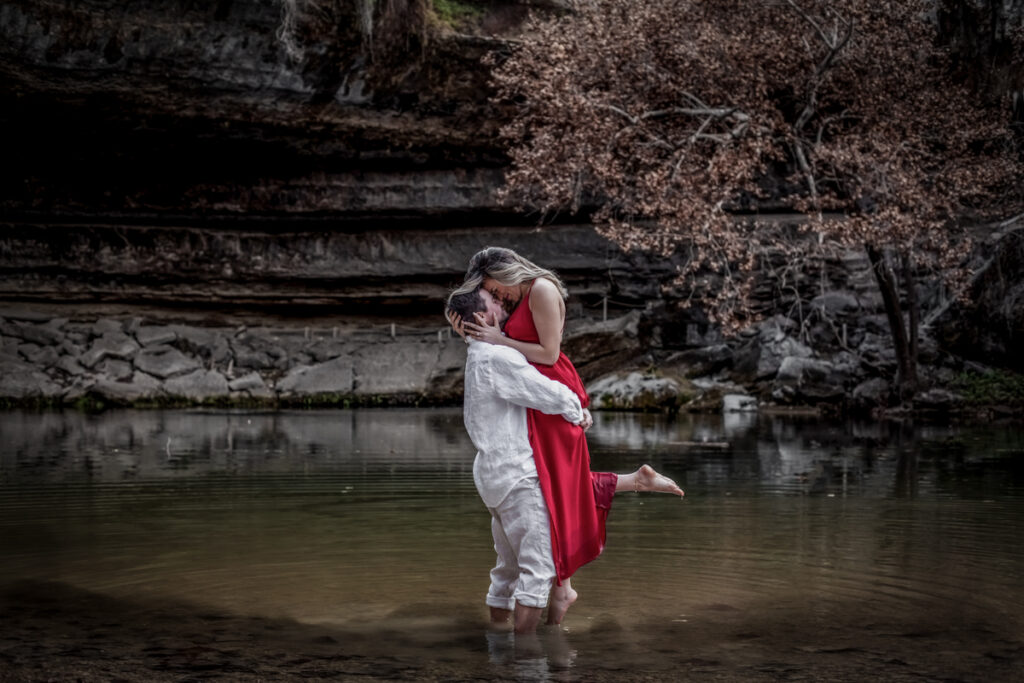 stunning engagement photo session of a young couple at Hamilton Pool Preserve and Hotel Vista