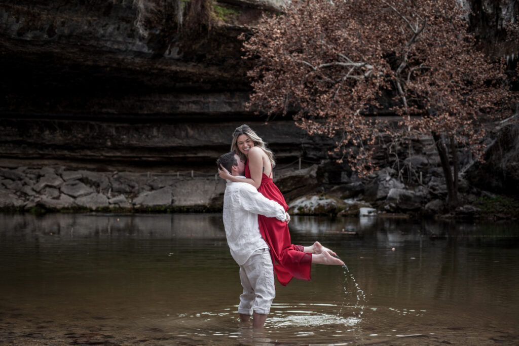 stunning engagement photo session of a young couple at Hamilton Pool Preserve and Hotel Vista