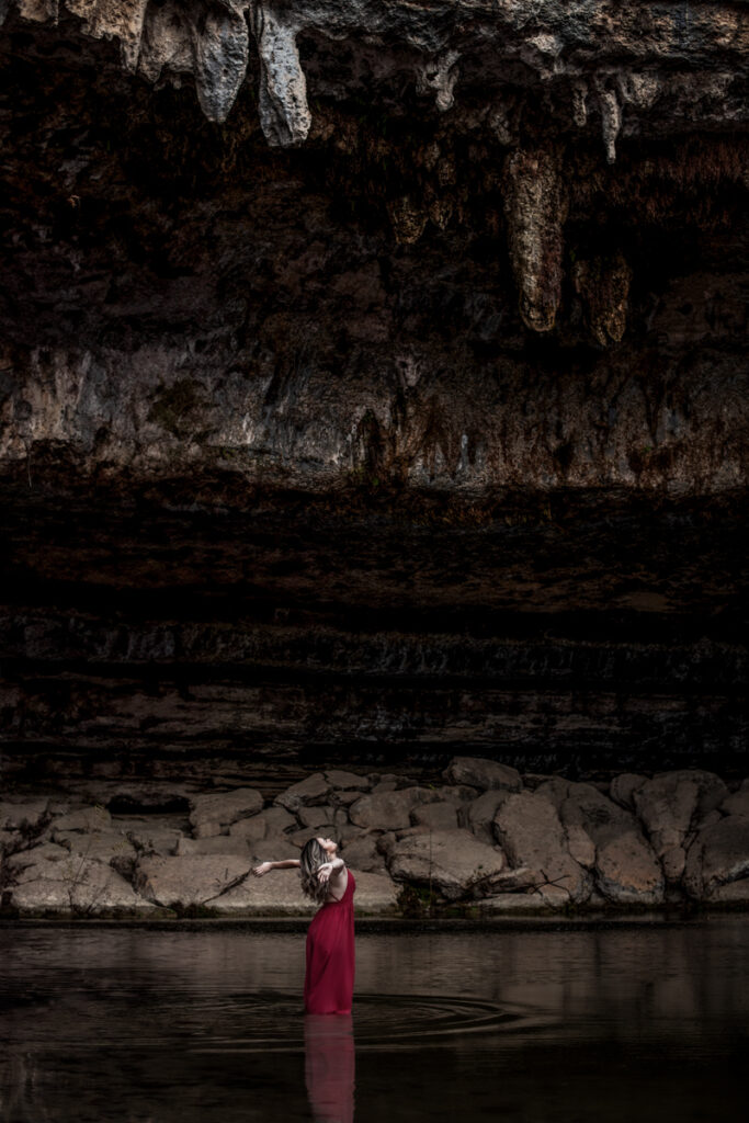 stunning engagement photo session of a young couple at Hamilton Pool Preserve and Hotel Vista