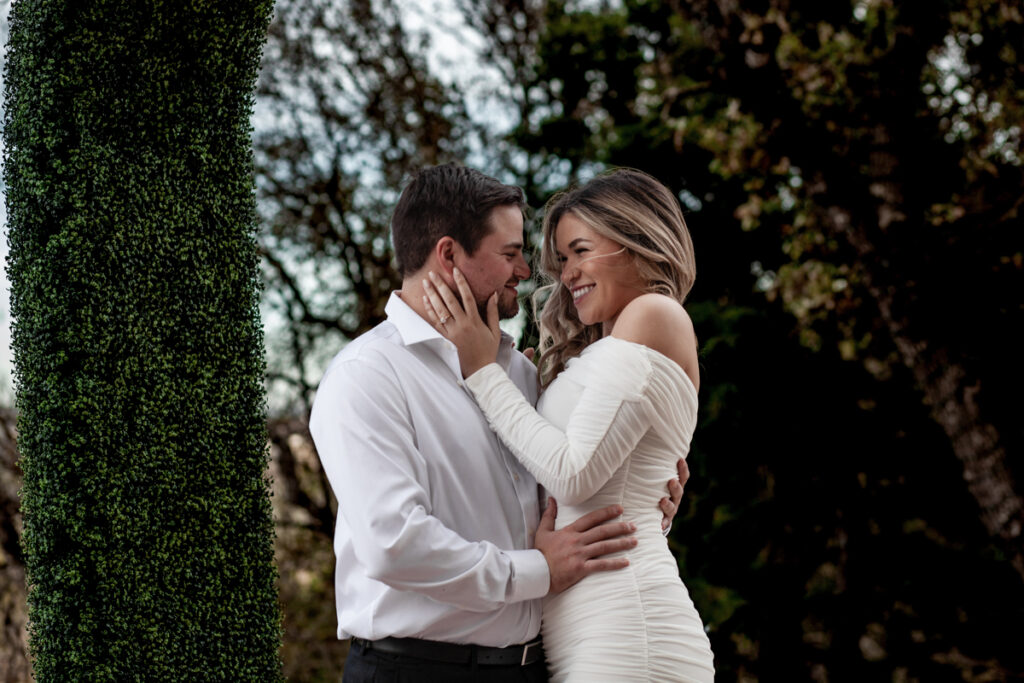 stunning engagement photo session of a young couple at Hamilton Pool Preserve and Hotel Vista