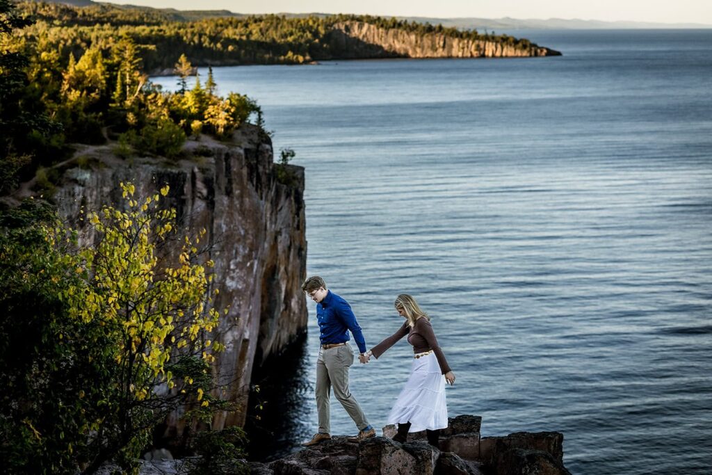 Wide shot of a North Shore proposal surrounded by cliffs and lake views