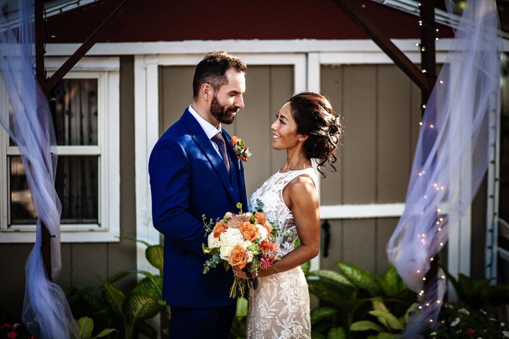 couples portraits during backyard wedding ceremony in minnesota