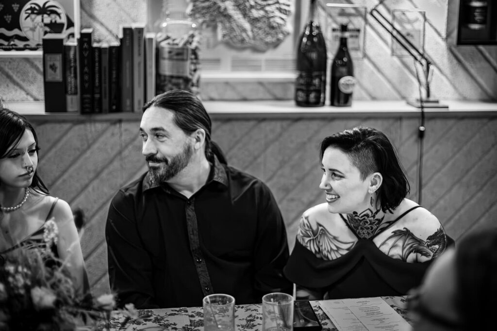 portraits of guests during oregon wedding reception at enoteca nostrana