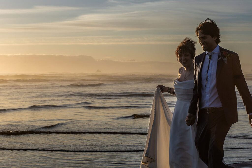 wedding portraits during sunset at cannon beach in oregon