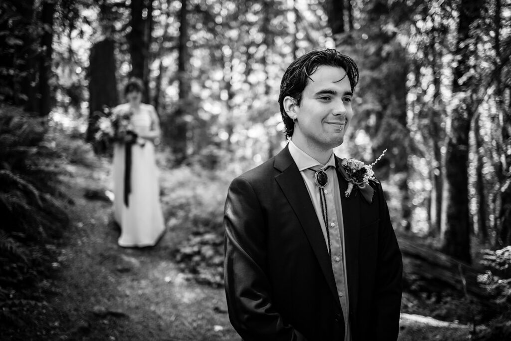 bride and groom about to have their first look before their hoyt arboretum wedding