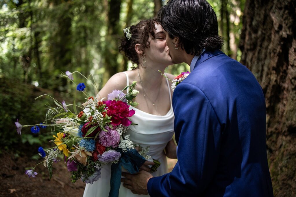 bride and groom embracing during hoyt arboretum first look moments