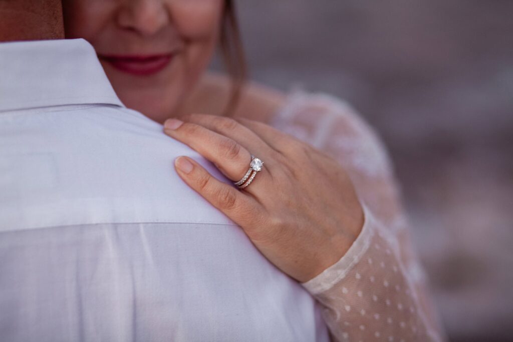 north shore proposals with close up of engagement ring