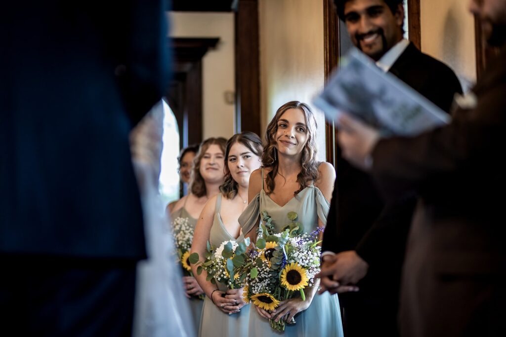 bridesmaids reactions during ceremony at semple mansion