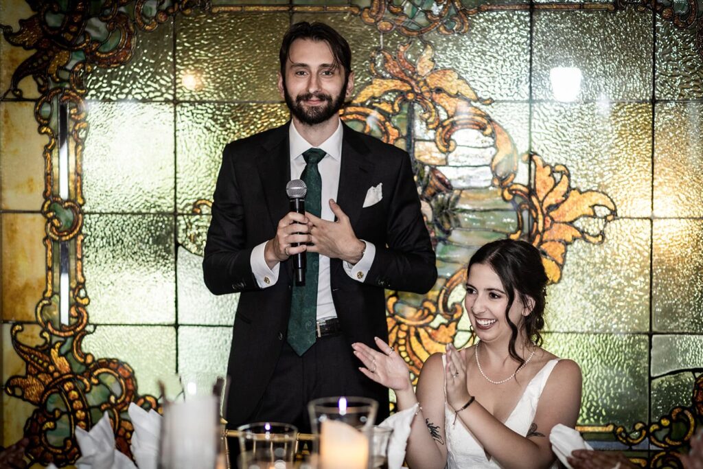 Couple sharing a toast at a Semple Mansion Wedding reception