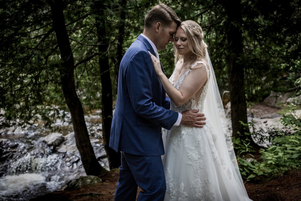 bride and groom embracing during minnesota small wedding day