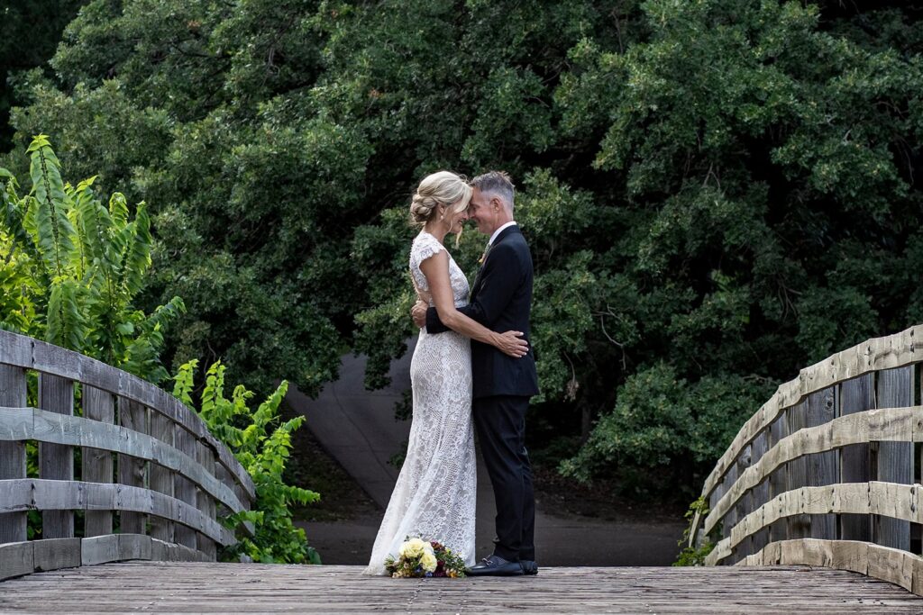 couple embracing during their elopement in minnesota
