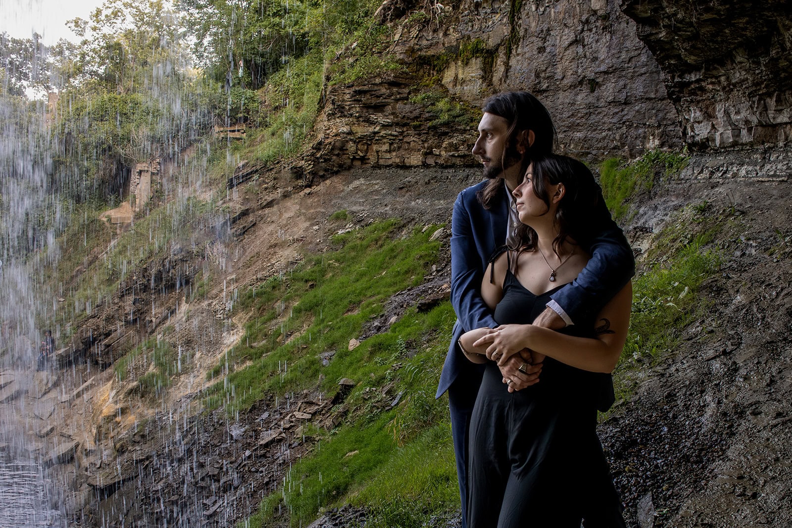 Jessica and Isaac sharing a quiet moment by Minnehaha Creek