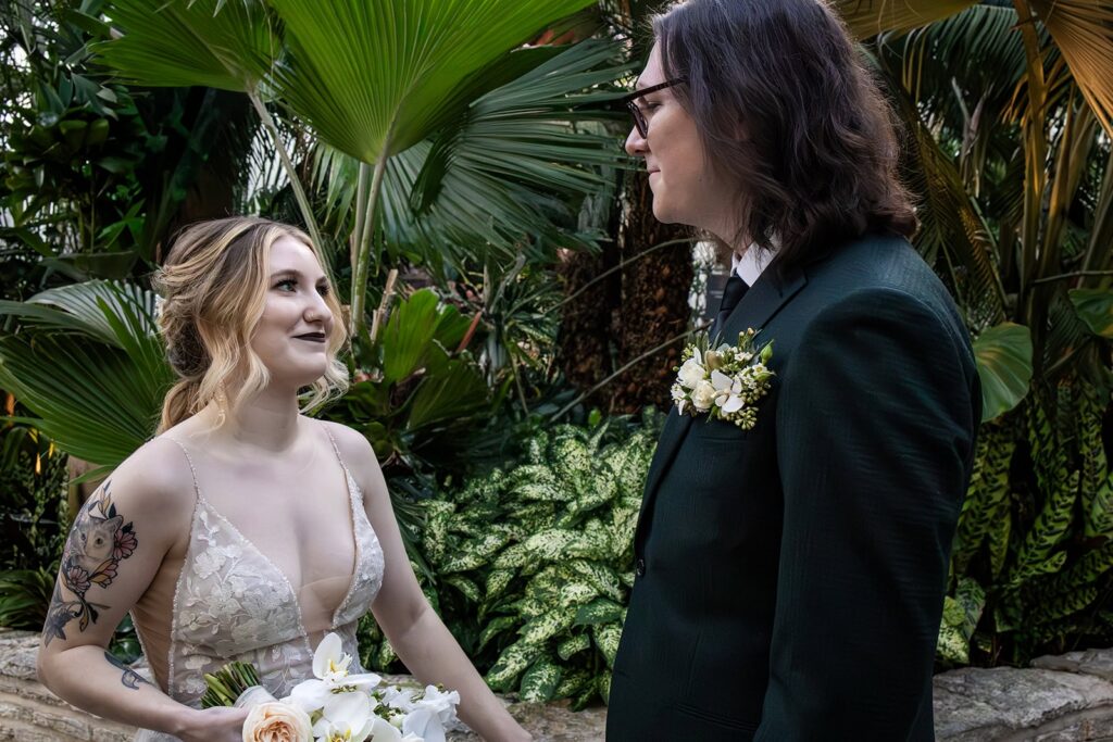 Groom seeing his bride for the first time during their first look in St. Paul, Minnesota