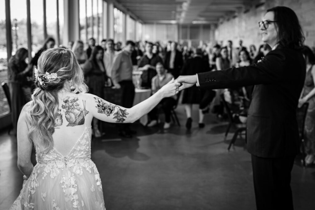 Bride and groom sharing their first dance as a married couple at their St Paul wedding reception