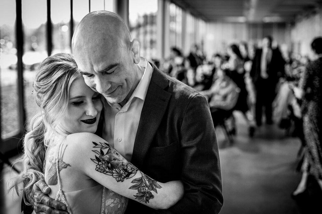 black and white photo of the bride and her father dancing during st paul wedding reception