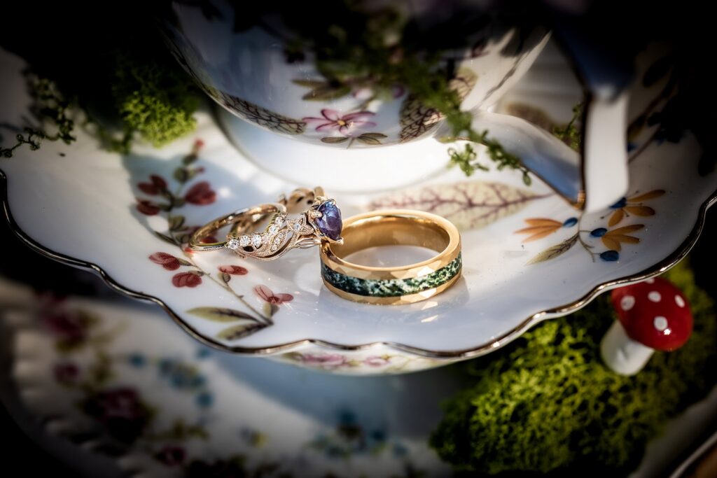 detail shot of wedding and engagement rings in the sunlight during minnesota wedding day